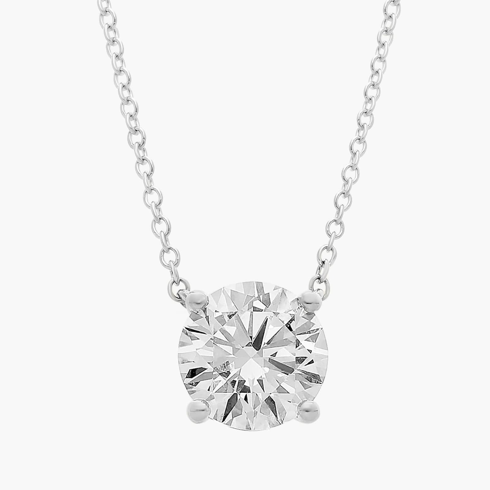 Round diamond solitaire necklace in white gold